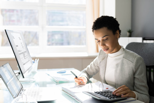 A woman working on a laptop